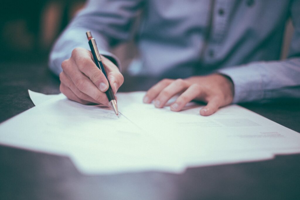 man taking notes